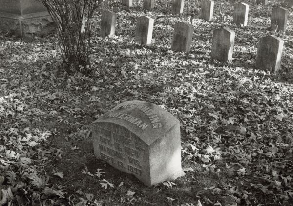Confederate Rest at the Forest Hill Cemetery, showing graves of Confederate soldiers who died as prisoners of war in Madison, Wisconsin, in 1862.  The grave in the foreground is of Mrs. Alice Whiting Waterman, a southerner by birth, who moved to Madison in 1868.  Widowed and without relatives in Wisconsin, Mrs. Waterman became interested in the neglected graves, and she spent the remaining twenty-five years beautifying Confederate Rest, before she also died and was buried among them as she requested.  Today the area is cared for by the city of Madison.
