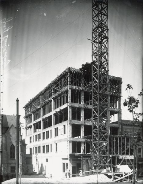 The Gay building on North Carroll Street on the Capitol Square, under construction.
