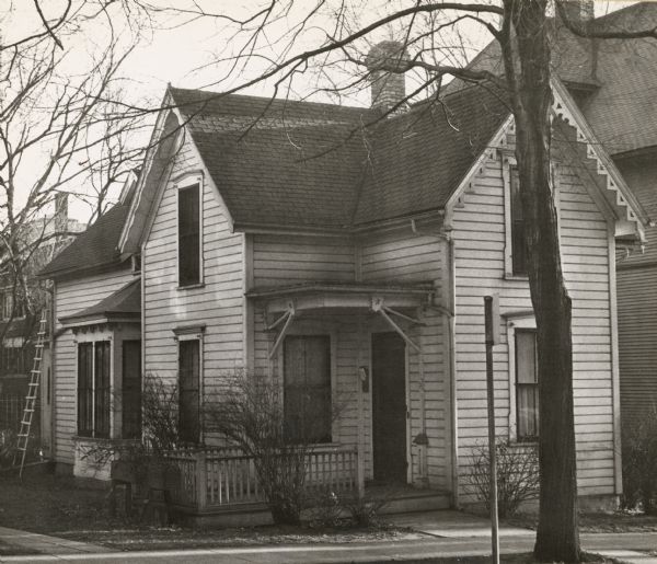 Corry-Larkin house, 107 West Gorham Street, built in 1876. After John Corry, Albert Frederickson presumably owned the house and rented it to a Mr. Butterfield. Ella & Irene Larkin, who were sisters and grade school teachers, also occupied the house for some years. One of the house's features was a small circular staircase.