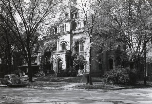 The Keenan House at 28 East Gilman Street, which was the residence of Dr. George Keenan, Chauncey Williams, and Col. J.H. Knight, and today a Madison landmark. The Keenan House is seen here with the Mansard roof which had been "modernized."