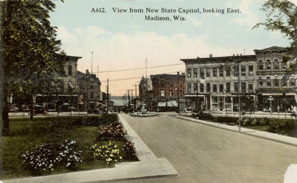 Colorized view of King Street as seen from the Capitol grounds. Caption reads: "View from New State Capitol, looking East, Madison, Wis."
