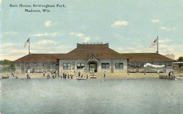 View across water towards the bath house. Caption reads: "Bath House, Brittingham Park, Madison, Wis."