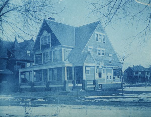 Cyanotype view of the Delta Tau Delta Chapter house, 621 North Lake Street, at the southeast corner of the intersection of Lake Street and Mendota Court.  Visible at left is the Chi Psi lodge, 627 North Lake Street.