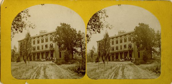 Stereograph of Lakeside House.  This hotel, originally known as the Water Cure, was built on the shore of Lake Monona in 1855.  It burned about 1870.