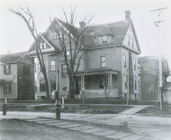 Charles N. Brown residence, southeast corner of the intersection of Frances and Langdon Streets. On the left is 263 Langdon Street. Both structures were demolished in 1929 to enable construction of Ann Emery Hall, 265 Langdon Street, named for the first Dean of Women (1897-1900) Ann Emery Allinson (1871-1932).