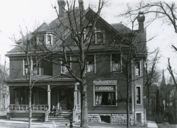 Isabel Winslow and friends on the steps of her parents' home, 131 Langdon Street.  Judge John B. Winslow and his wife had the house built in 1894.