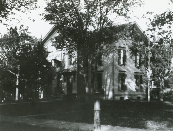 240 Langdon Street, residence of attorney William A.P. Morris. In 1902 Morris built and moved to a house at 635 Howard Place. He financed a brick street at the new location and according to the <i>Wisconsin State Journal</i>, (June 6, 1900), erected several "strictly modern cottages for the accomodation and enjoyment of tenants of moderate means but discriminating taste."