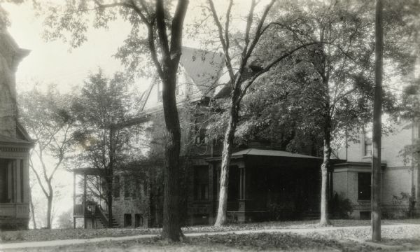 112 Langdon Street, built in 1893 for attorney Burr Jones (1846-1935).  It was purchased by the Alpha Delta Pi fraternity in 1921 and was used by them until 1933.  It was demolished in 1966.  Visible at left is 120 Langdon, and at right, 104 Langdon.