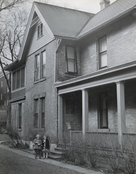 The Mack House, 110 East Johnson Street.  The West wall of the house shows details on the gables and trim.  Built by A.C. Isaac around 1870, it was later the residence of Professor John G.D. Mack and family, and was owned in 1953 by J.P. Cafferty.