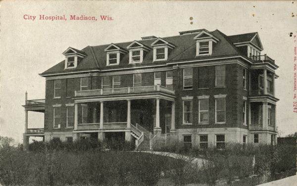 Madison General Hospital, showing the original unit of what eventually became a large complex of additions. Demolished 1963-1964 prior to construction of a new wing in its place. Caption reads: "City Hospital, Madison, Wis."