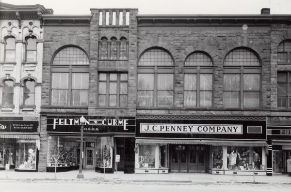 A view of East Main Street on the Capitol Square, showing the Capitol City Bank building, Feltman-Curme Shoes, and J.C. Penney Company.