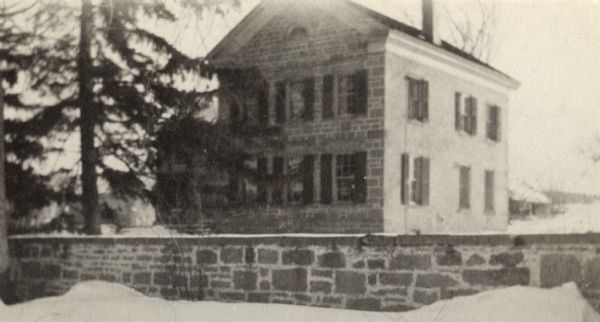 An old house east of the Hill Farm House on Middleton Road. The house was remodeled by Sam Miller, who named it Mapleside.