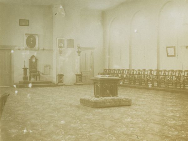 An interior view of the Masonic Temple, looking west through the Lodge room.
