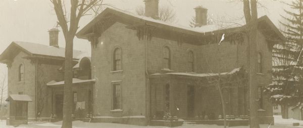 Simeon Mills (farm) residence, 2709 Sommers Avenue. This Victorian Italianate residence was built from local sandstone in 1863. Mills, an early Madison settler and a prominent figure in commercial and governmental activities, lived here until 1868. The property was once known as "Mills Folly" for being located so distantly from the center of town. Later residents included J.W. Hudson, a leading industrialist, and Sam Miller, a nationally known opera and theater promoter. The house was added to the National Register of Historic Places in 1987.