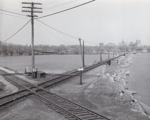Elevated view of the Milwaukee Road and Chicago & Northwestern Railway crossing on Monona Bay, the site of the old MX tower.