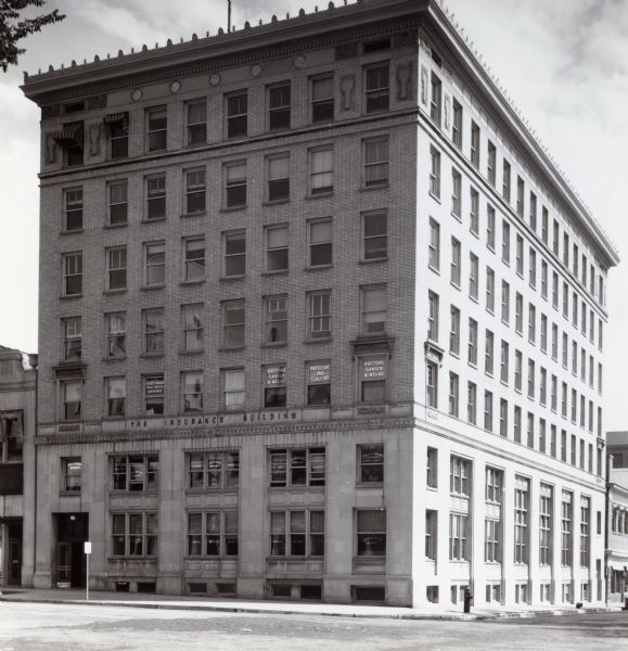 The Insurance Building, located at 119-123 Monona Avenue.