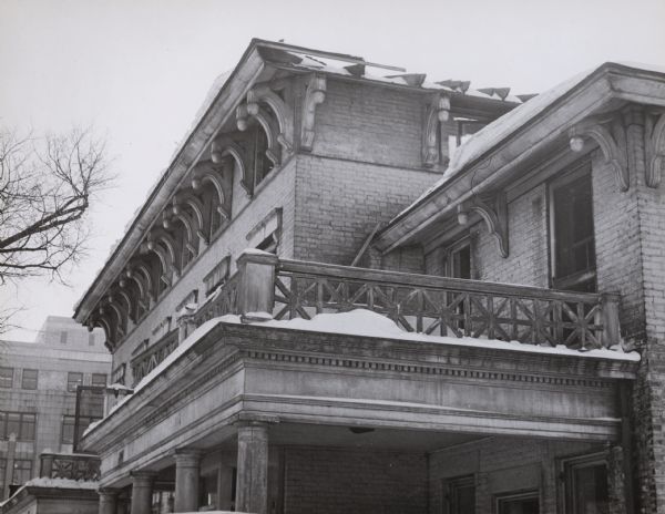 The Atwood / Buck-Neckerman House, at 210-214 Monona Avenue (now Martin Luther King, Jr. Boulevard), built in the late 1840s by General David Atwood and his partner Royal Buck as a double house and later lived in by George and Elizabeth Neckerman. Cornice detail on the front of the house. The house was torn down in 1951.