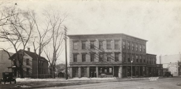The Nolden building on the corner of State and Fairchild Streets. This would later become the site of Yost Department Store. The Nolden sisters are standing in the doorway.