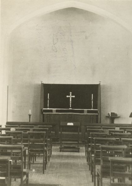 View towards the front altar of the church and its seating arrangement.