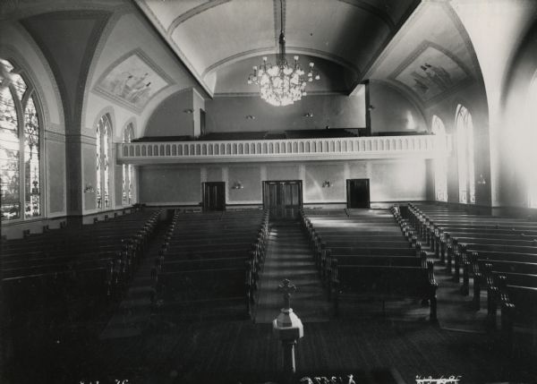 An interior view of St. John's Lutheran Church, looking towards the back of the church, at 320-322 East Washington Avenue.