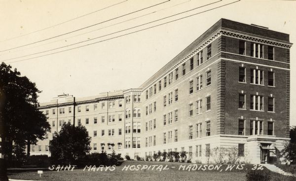 Exterior view of Saint Mary's Hospital, located at 707 South Mills Street. Caption reads: "Saint Marys Hospital - Madison Wis."
