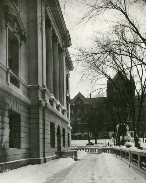 View of the Langdon Street side of the Wisconsin State Historical Society. In the background is Science Hall.