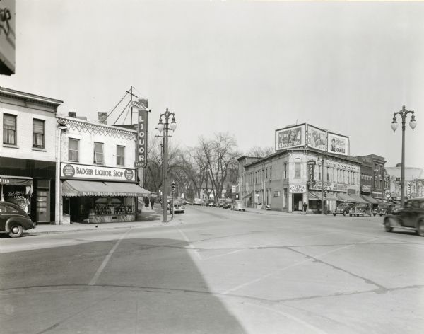 Intersection of State and Gorham Streets showing Capitol Radio and Badger Liquor Shop.