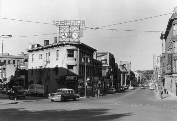 View of State Street, looking west. Across the intersection on the corner is Sandra's Millinery at 101 State Street.