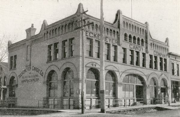 Exterior view of the Teckemeyer Candy Company, located at the corner of Main and Butler Streets.