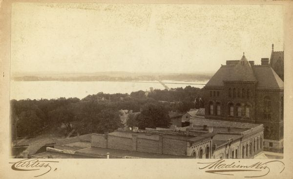 View towards Lake Monona, with the Dane County Courthouse on the right. Text at bottom reads: "Curtiss Madison Wis."