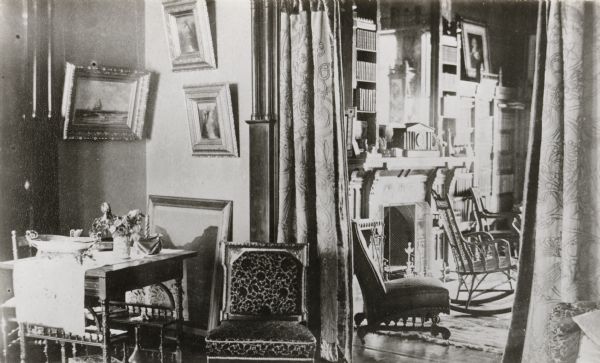 An interior view of the parlor and library of the William F. Vilas house, 12 East Gilman Stsreet, before remodeling in 1902.