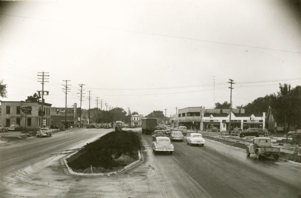 Slightly elevated view of East Washington Avenue at Union Corners (Milwaukee Street & North Street) when it first opened after its expansion.