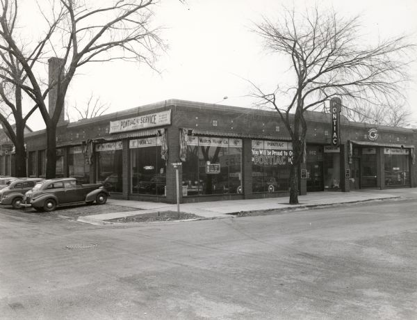 View from intersection towards the Waters Motor Company, located at 802 East Washington Avenue.