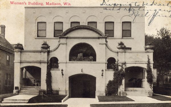An exterior view of the Madison Woman's Club Building, 240 West Gilman Street. Built from 1904 to 1908, the building was designed by J.K. Cady, architect. Caption reads: "Woman's Building, Madison, Wis."