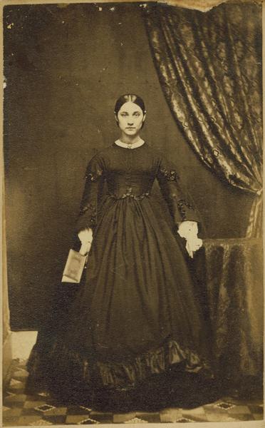 A carte-de-visite portrait of Mrs. Nellie Brant of Brodhead, Wisconsin.