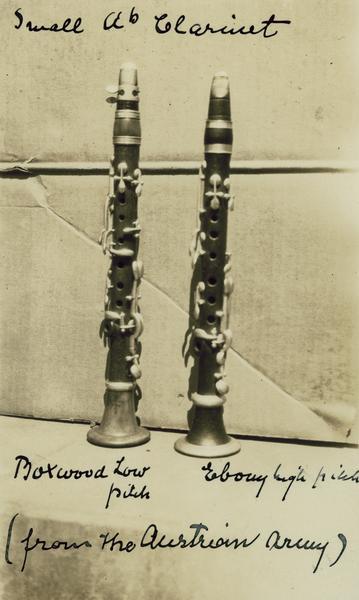 Two "Small A flat" clarinets from the Austrian Army. One is a Boxwood Low Pitch and one Ebony High Pitch.
