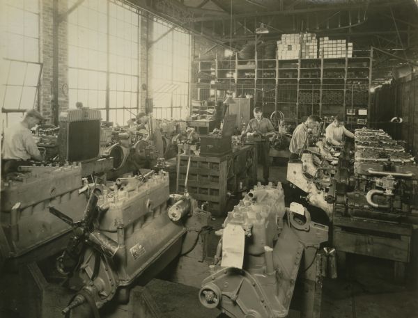 Factory workers in the Motor Assembly Department of the Winther Motor and Truck Company.