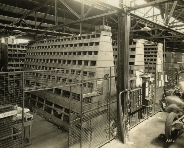 Interior of a stockroom at the Winther Motor and Truck Company factory.