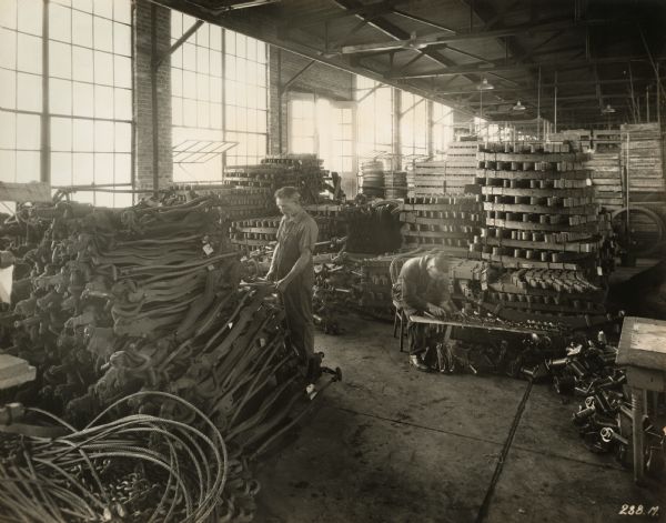 Men working in the Spring Department at Winther Motor and Truck Company.