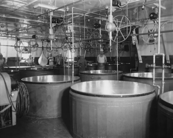 Interior of the making room as the workers drain whey.