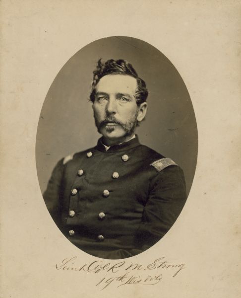 Oval-framed waist-up portrait of Colonel Rollin M. Strong of the 19th Wisconsin Volunteers.