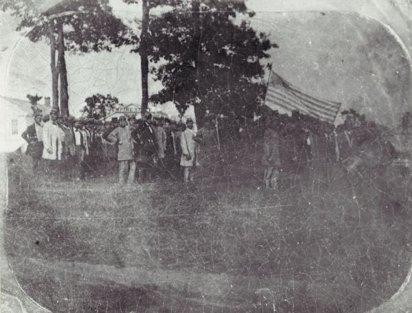 Recruits in their camp grey uniforms, before they were issued their regular blues.