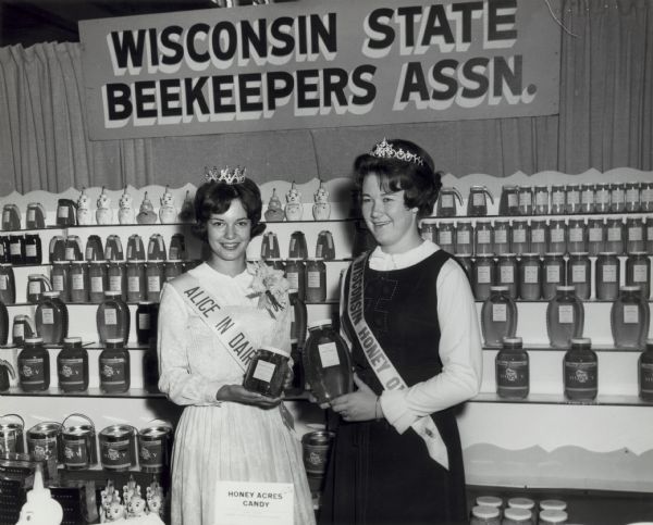 Alice in Dairyland and the Wisconsin Honey Queen at a Wisconsin Beekeepers display.