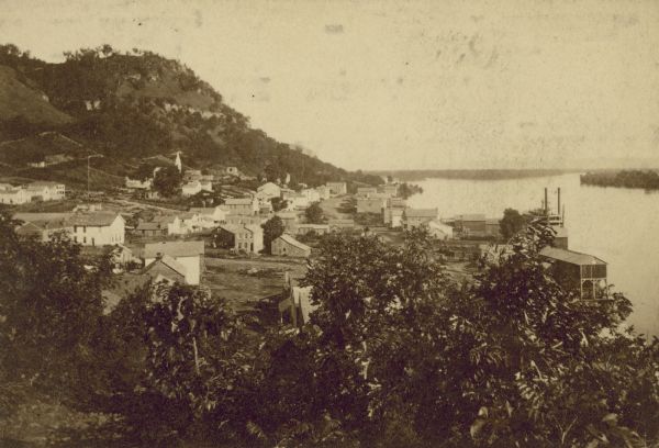 Elevated view form hill of the town of Victory on the bank of a river.