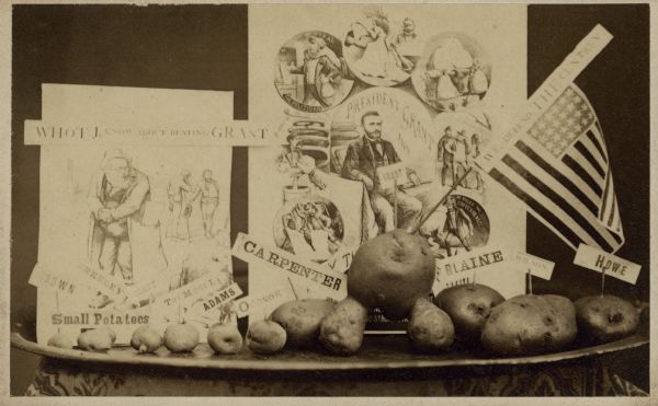 A carte-de-visite of a political display about President Grant, utilizing posters and potatoes.