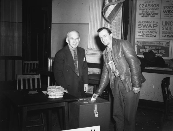 Members of Local 1131, United Electrical Workers (Louis Allis Company) cast votes for a strike.