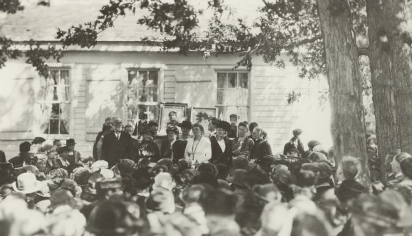 A memorial ceremony at the Frances Willard school house.
