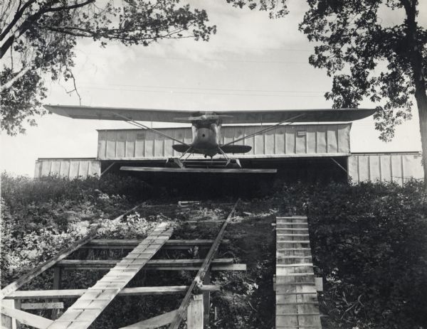 Pontoon airplane owned by Dr. Reginald Jackson Sr., at the seaplane hangar at the family home at Second Point on Lake Mendota.