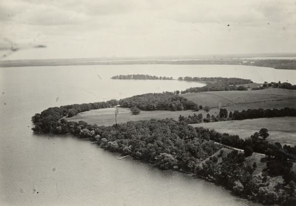An aerial view of both Picnic Point and Second Point looking toward the isthmus. Members of the Jackson Family had summer homes at Second Point at this time.