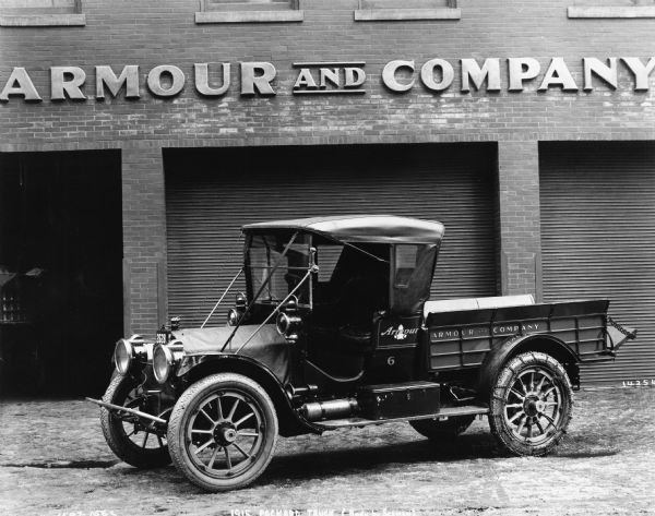 A 1915 Packard Truck owned by Armour and Company.  Its body was produced by the W.S. Seaman Company.
